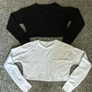 Black and white long sleeve crop shirts. Size small. Thumb holes